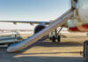 Billion-Dollar Airport FAIL – Who Let This Happen? Airplane emergency slide deployed on airport tarmac