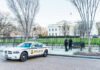 Afghan Ex-CIA Shooter Sparks White House Chaos Police car and officers in front of large building