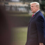 House DESTROYS Socialist Agenda Before Trump’s Meeting Man in suit walking outside on grassy area